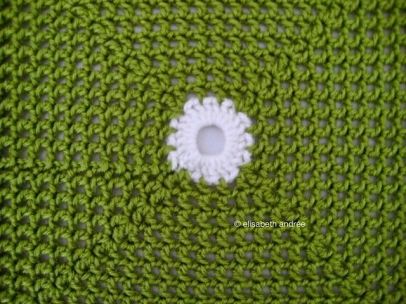 square of green with dots blanket