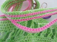 crochet green bag with bright pink details